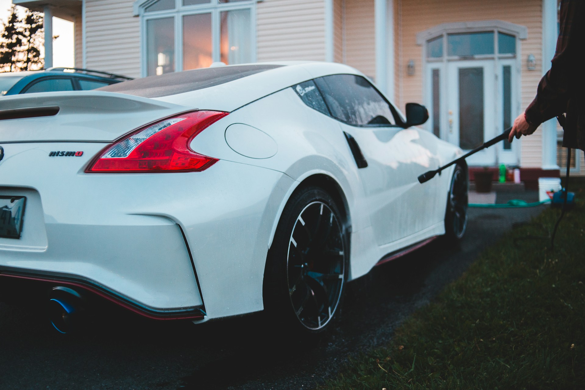 a mobile detailer in atlantic city nj area washing a white car